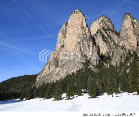 Majestic peaks seen from the Langental Valley near Wolkenstein, South Tirol. Majestic peaks seen from the Langental Valley near Wolkenstein, South Tirol. 112965304