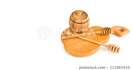 Set of wooden kitchen utensils isolated on white. There is space for text. Wide photo. 112965410