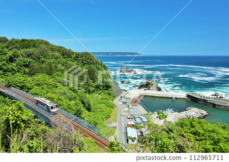 Iwate Prefecture Sanriku Railway with Blue Sky and Blue Sea Iwate Prefecture Sanriku Railway with Blue Sky and Blue Sea 112965711