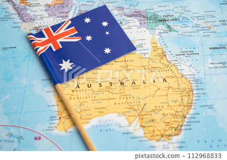 Bangkok, Thailand December 7, 2023, Australia flag on world map background. Bangkok, Thailand December 7, 2023, Australia flag on world map background. 112968833