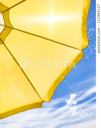Yellow beach umbrella Yellow beach umbrella 112969127