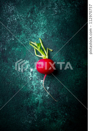 Fresh organic radish on green background 112970757