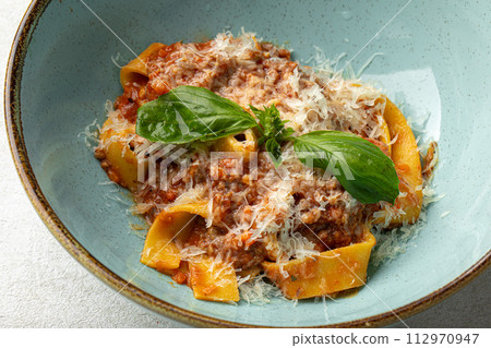 Italian appetizing fettuccine bolognese Italian appetizing fettuccine bolognese 112970947