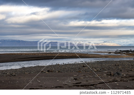 River flowing to the ocean, Iceland River flowing to the ocean, Iceland 112971485