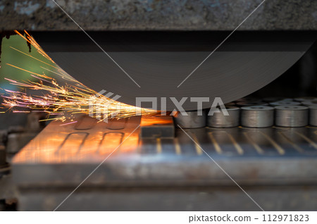 Finishing metal working on horizontal surface grinder machine 112971823