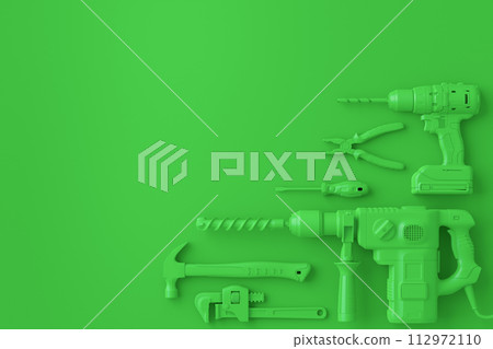 Top view of monochrome construction tools for repair on multicolor background Top view of monochrome construction tools for repair on multicolor background 112972110