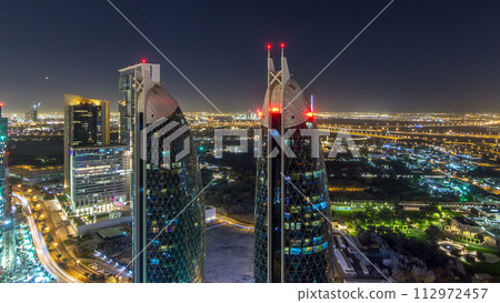 Skyline view of the buildings of Sheikh Zayed Road and DIFC night timelapse in Dubai, UAE. Skyline view of the buildings of Sheikh Zayed Road and DIFC night timelapse in Dubai, UAE. 112972457
