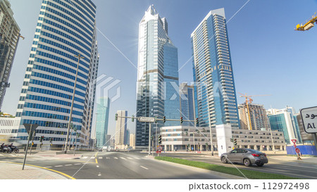 Amazing view of Dubai Skyline timelapse hyperlapse. Residential and Business Skyscrapers in Downtown Amazing view of Dubai Skyline timelapse hyperlapse. Residential and Business Skyscrapers in Downtown 112972498