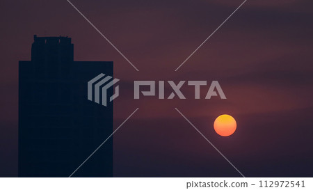 Foggy morning sunrise in downtown of Dubai timelapse. Foggy morning sunrise in downtown of Dubai timelapse. 112972541