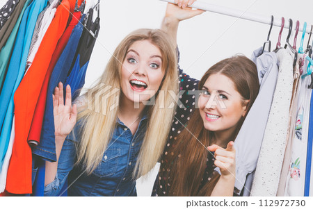 Happy women clothes shopping Happy women clothes shopping 112972730
