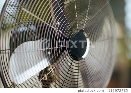 Closeup on electric ventilator 112972785