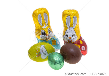 Easter chocolate bunny with eggs isolated Easter chocolate bunny with eggs isolated 112973026