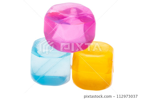 colored ice cubes isolated colored ice cubes isolated 112973037