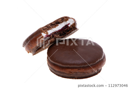 chocolate biscuit sandwich in chocolate glaze isolated chocolate biscuit sandwich in chocolate glaze isolated 112973046