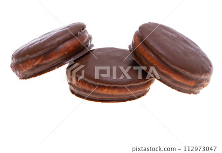 chocolate biscuit sandwich in chocolate glaze isolated chocolate biscuit sandwich in chocolate glaze isolated 112973047