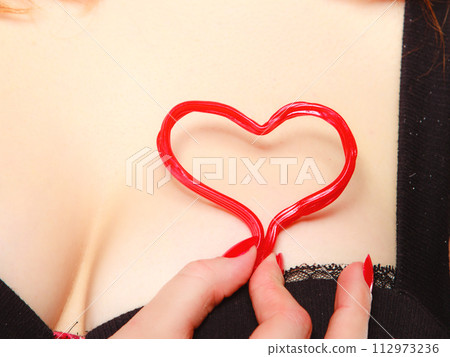 Girl holding valentine red heart love symbol. Valentines day. Girl holding valentine red heart love symbol. Valentines day. 112973236