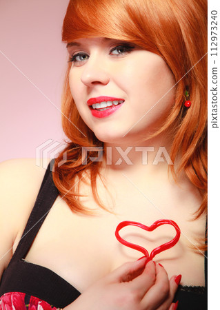 Girl holding valentine red heart love symbol. Valentines day. Girl holding valentine red heart love symbol. Valentines day. 112973240