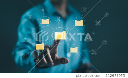 (DMS) Document management system concept. Businessman touching large folder to manage document files in folders. file storage on cloud. share database online, software for archiving and company data. 112973955