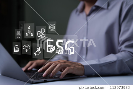 ESG environmental social governance investment business concept. Businessman working with ESG report icons. Analysis of ESG sustainability and corporate social responsibility. sustainable environment, 112973983