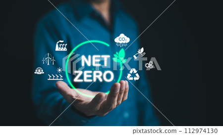 Net Zero emissions concept. Man holding to carbon reduction icons. Carbon footprint, Carbon neutral, CO2 neutrality, Sustainable energy, Climate change, Greenhouse gas, Global warming, green business, 112974130