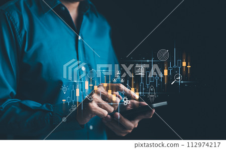 Businessman analyzing stock market investment data with candlestick chart virtual and business icons. foreign exchange, trade fund, crypto money, business growth, investor, cryptocurrency trend, 112974217