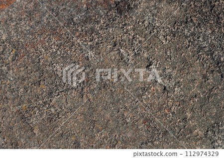 Dark grey stone background Dark grey stone background 112974329
