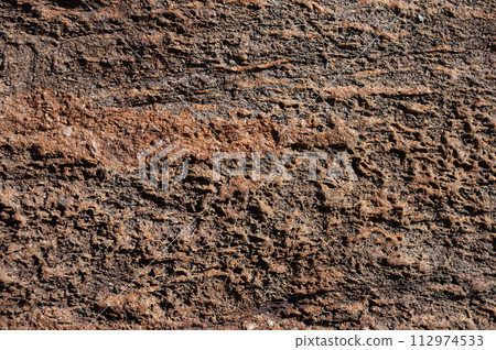 Background of brown stone surface Background of brown stone surface 112974533