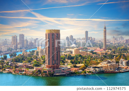 Aerial view of Gezira island on the Nile at sunset, Cairo, Egypt Aerial view of Gezira island on the Nile at sunset, Cairo, Egypt 112974575