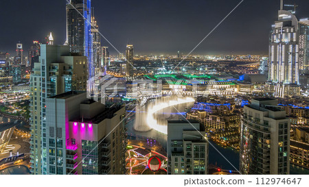 Dubai downtown cityscape with Burj Khalifa, LightUp light show aerial timelapse Dubai downtown cityscape with Burj Khalifa, LightUp light show aerial timelapse 112974647