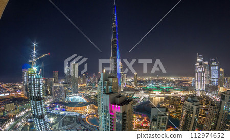 Dubai downtown cityscape with Burj Khalifa, LightUp light show aerial timelapse Dubai downtown cityscape with Burj Khalifa, LightUp light show aerial timelapse 112974652