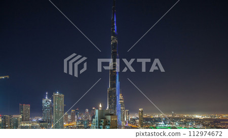Dubai downtown cityscape with Burj Khalifa, LightUp light show aerial timelapse Dubai downtown cityscape with Burj Khalifa, LightUp light show aerial timelapse 112974672