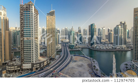 Amazing colorful dubai marina skyline during sunset timelapse 112974705