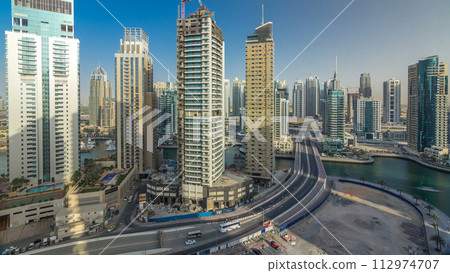 Amazing colorful dubai marina skyline during sunset timelapse 112974707