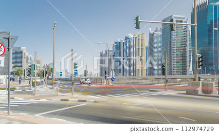 Amazing view on Sheikh Zayed road surrounded Dubai Marina and JLT skyscrapers 112974729