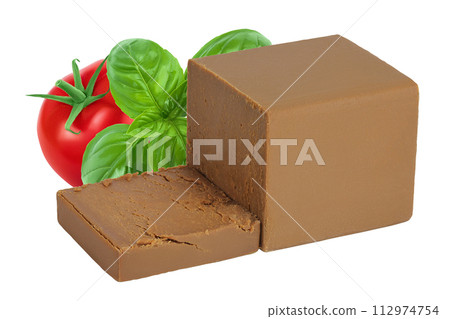 Brown cheese. Norwegian brunost isolated on white background with full depth of field Brown cheese. Norwegian brunost isolated on white background with full depth of field 112974754