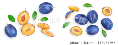 fresh blue plum and half with leaves isolated on white background. Top view. Flat lay fresh blue plum and half with leaves isolated on white background. Top view. Flat lay 112974767