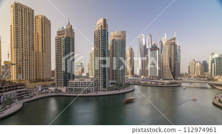 Amazing colorful dubai marina skyline during sunset timelapse 112974961