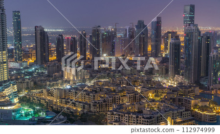 Dubai downtown night to day timelapse. Top view from above Dubai downtown night to day timelapse. Top view from above 112974999