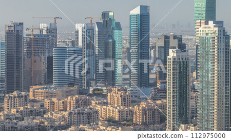 Dubai downtown morning scene timelapse. Top view from above Dubai downtown morning scene timelapse. Top view from above 112975000