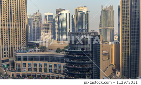 Amazing colorful dubai marina skyline during sunset timelapse Amazing colorful dubai marina skyline during sunset timelapse 112975011
