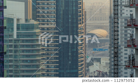 Amazing colorful dubai marina skyline during sunset timelapse 112975052