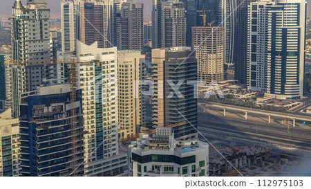 Amazing colorful dubai marina skyline during sunset timelapse 112975103