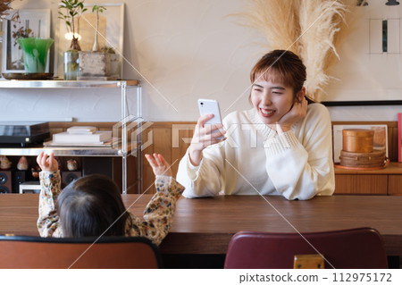 mother taking care of her child 112975172