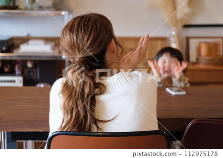 mother taking care of her child 112975178