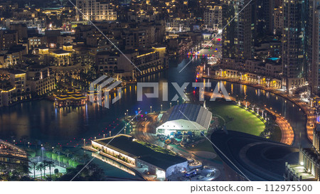 Dubai Downtown night timelapse modern towers panoramic view from the top in Dubai, United Arab Emirates. Dubai Downtown night timelapse modern towers panoramic view from the top in Dubai, United Arab Emirates. 112975500