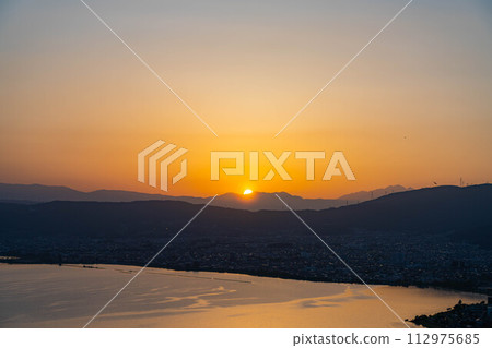 [Sunset material] Sunset seen from Tateishi Park [Nagano Prefecture] 112975685