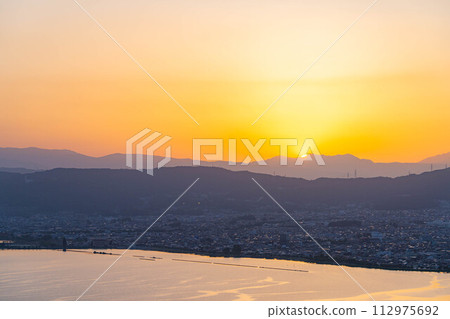 [Sunset material] Sunset seen from Tateishi Park [Nagano Prefecture] 112975692