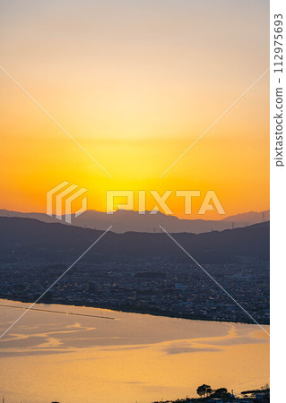 [Sunset material] Sunset seen from Tateishi Park [Nagano Prefecture] 112975693