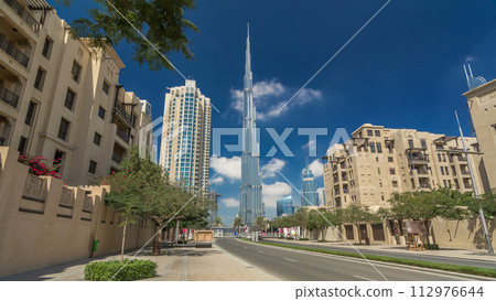 Walking on Dubai street Dubai Skyline timelapse hyperlapse. Residential and Business Skyscrapers in Downtown Walking on Dubai street Dubai Skyline timelapse hyperlapse. Residential and Business Skyscrapers in Downtown 112976644