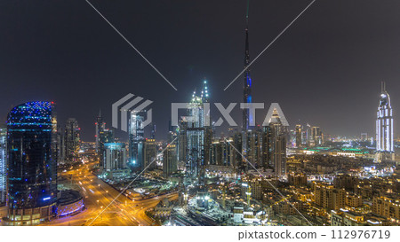 Dubai downtown cityscape with Burj Khalifa, LightUp light show aerial timelapse Dubai downtown cityscape with Burj Khalifa, LightUp light show aerial timelapse 112976719